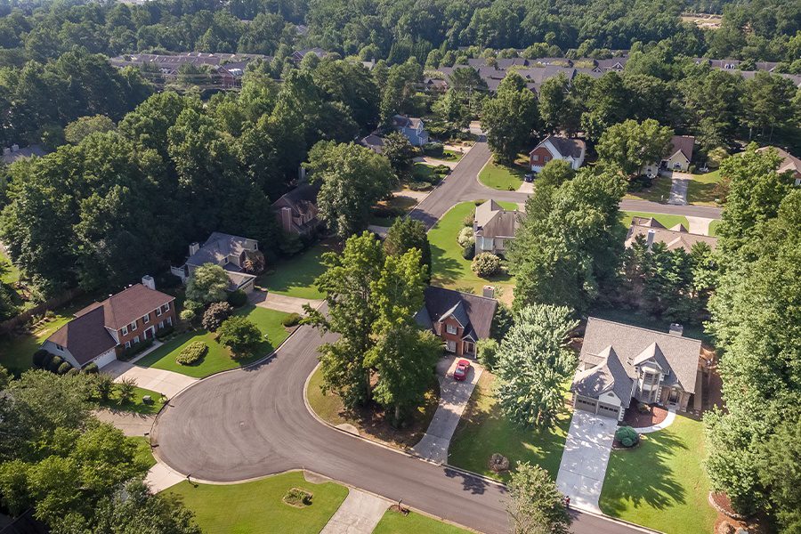 Contact - Aerial Picture of Typical Suburban Neighborhood Houses in Tennessee
